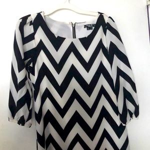 Sequin Heart’s formal black and white zigzag dress